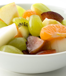 a photo of a Fruit salad close up in a bowl