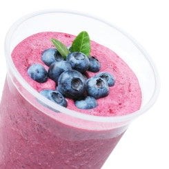 fresh fruit smoothy a photo of a fresh fruit smoothy in a cup