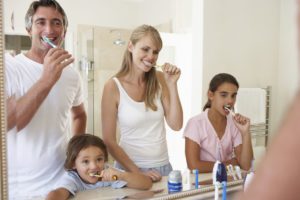 Brushing together helps teach good oral hygiene