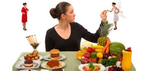A woman sits at a table filled with various foods, contemplating her choices. In the background, two small figures represent contrasting dietary options: one in red symbolizing unhealthy food and another in white symbolizing healthy choices.
