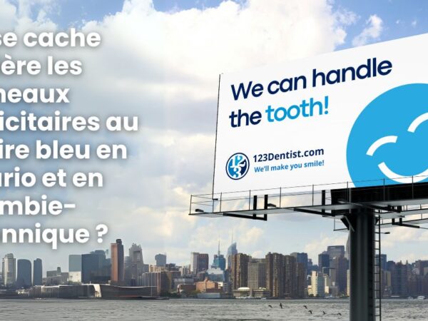 A billboard featuring the friendly 123Dentist Smiley and the text "We can handle the tooth!" is set against a city skyline. The advertisement invites curiosity about the campaign behind the blue smiley face in Ontario and British Columbia.